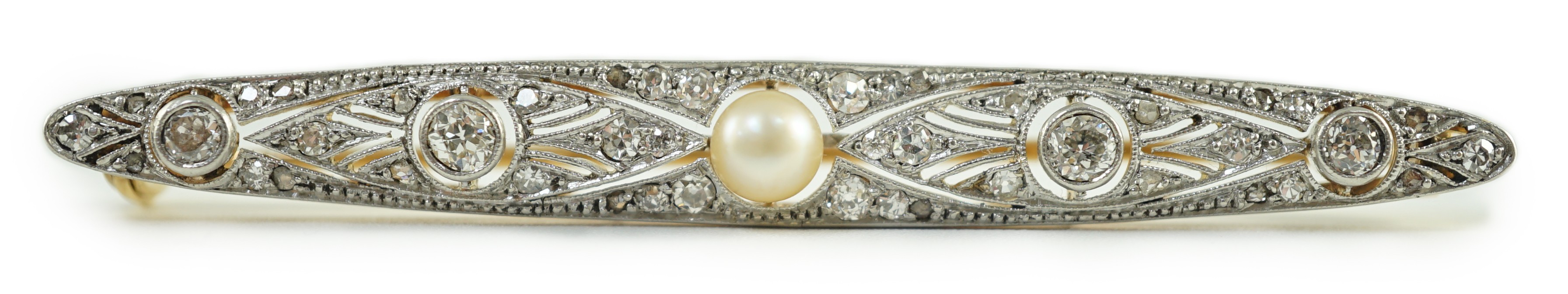 An early 20th century Belle Epoque, gold and platinum, pearl and millegrain set round and rose cut diamond navette shaped bar brooch